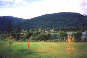 View of golf course and Green Lake from master bedroom balcony deck
