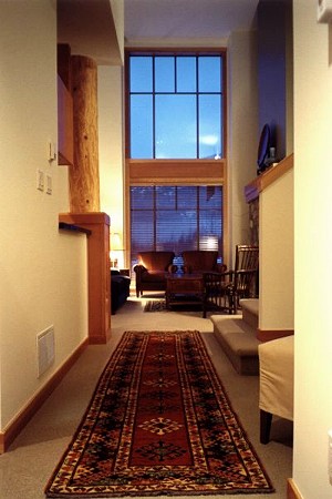 Grand entry hall with picture window looking out to Green Lake