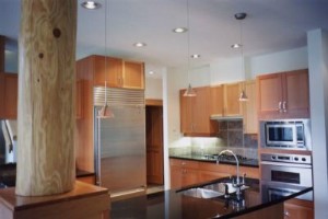 Spacious kitchen with granite counters and Sub-Zero & Bosch appliances