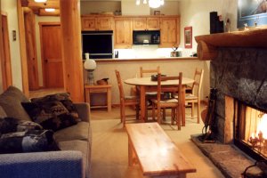 Fully equipped kitchen with dining table seating for four