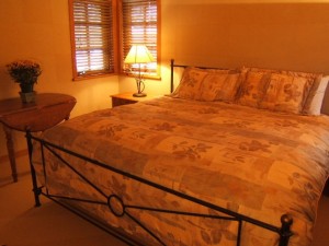 Master bedroom with king bed and huge ensuite bathroom with heated tile floor